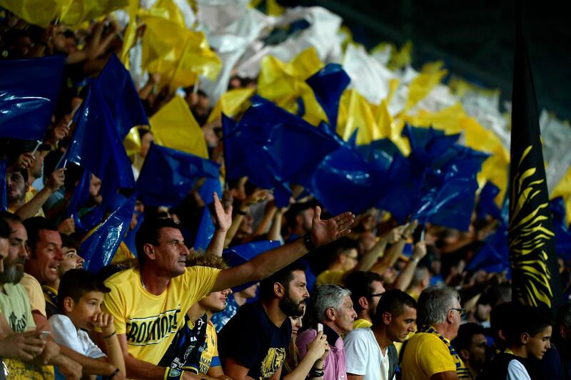 Frosinone's fans cheer and wave flags during the game against Juventus. AFP