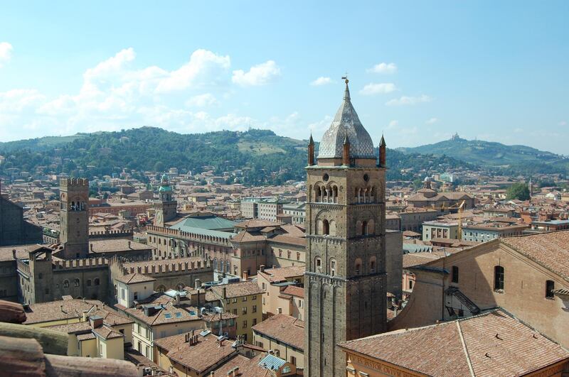 With its red roof tiles and medieval towers, Bologna is unspoilt by excessive tourism. Courtesy Bologna Welcome