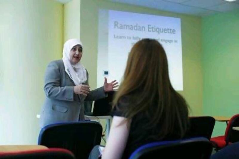 Language tutor Kariman Al Assil teaches non-Muslim expats everything they need to know about Ramadan at a special workshop in Abu Dhabi. Lee Hoagland / The National