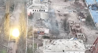 A tank fires a round in Soledar, Donetsk region. Reuters