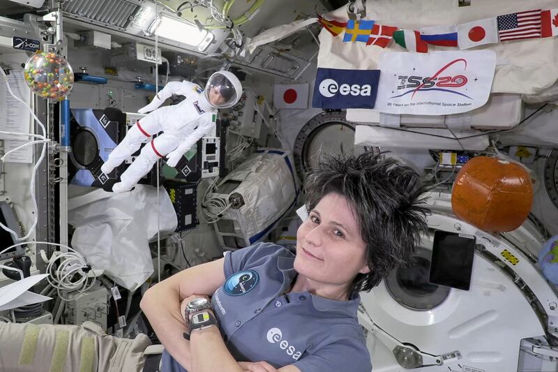 Europe's first female commander of the ISS, ESA astronaut Samantha Cristoforetti with her lookalike Barbie doll on the International Space Station. Reuters