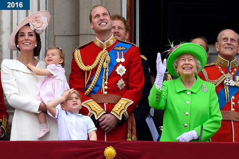 2016: Prince Charles, Catherine, Duchess of Cambridge, Princess Charlotte, Prince George, Prince William, Prince Harry, the queen, and Prince Philip stand on the balcony during the Trooping the Colour, this year marking the Queen's 90th birthday at The Mall.