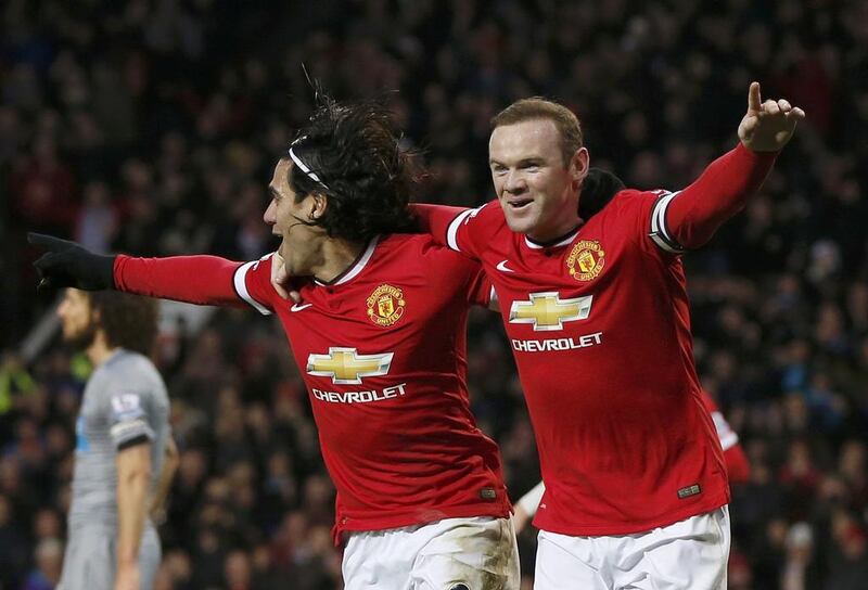 Wayne Rooney (R) celebrates after scoring against Newcastle with team-mate Radamel Falcao during their English Premier League encounter on December 26. Phil Noble/Reuters