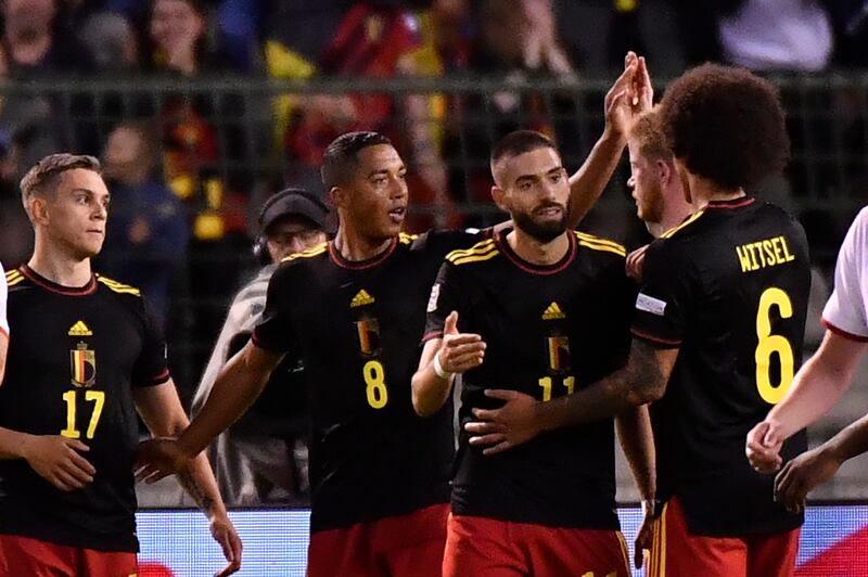 Belgium players celebrate their third goal, scored by Leandro Trossard. AP