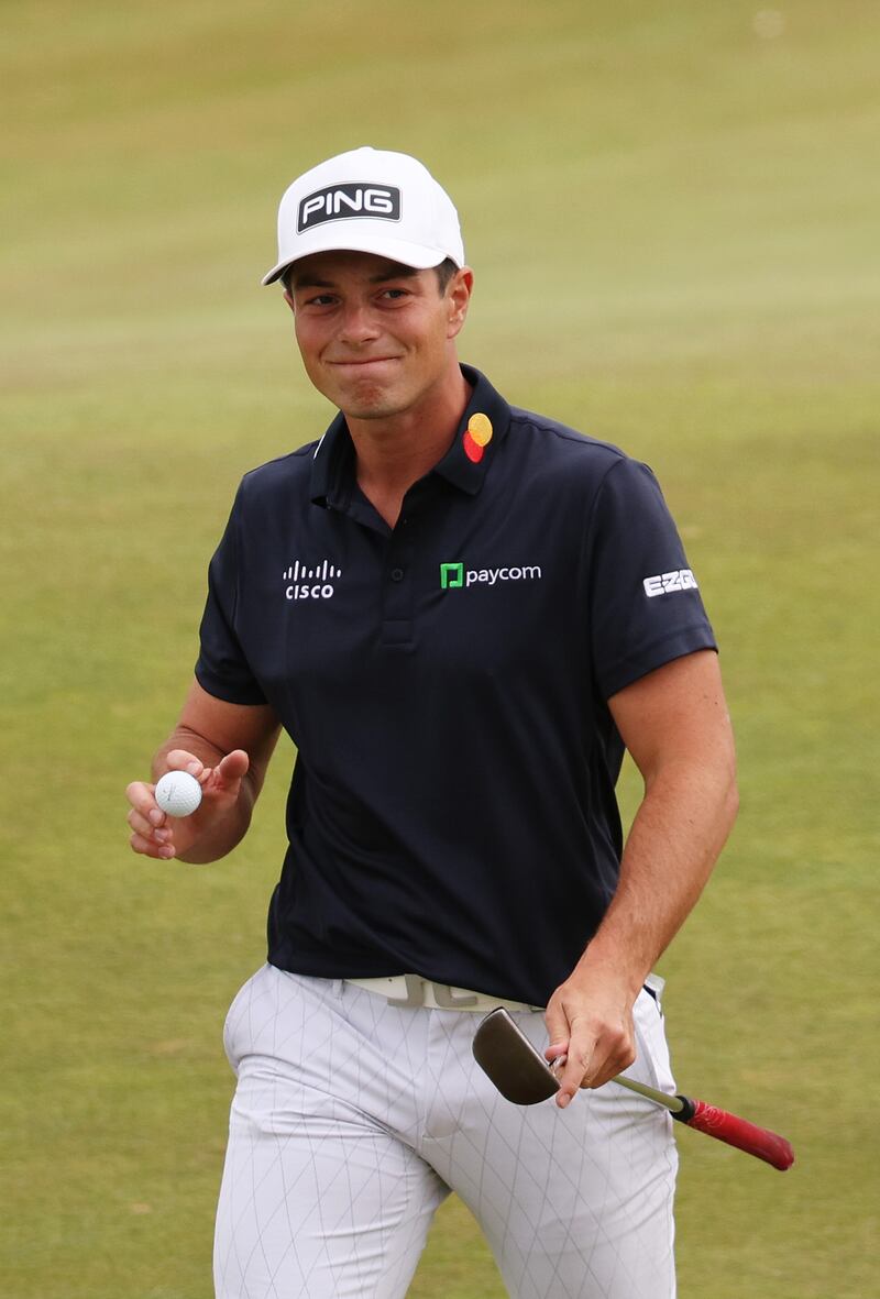 Viktor Hovland of Norway acknowledges the crowd on the 7th green. Getty