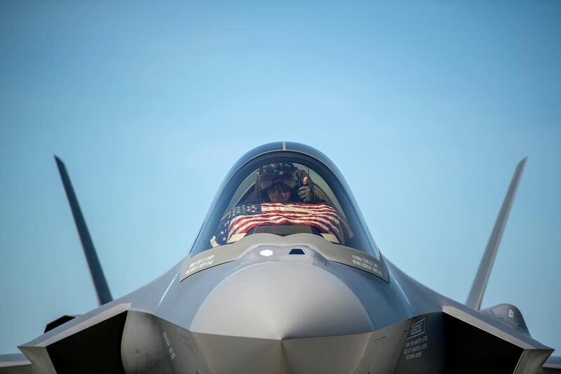FILE PHOTO: An F-35 pilot prepares for take off from the Vermont Air National Guard Base with the flag of the United States, before a flyover honoring Vermont’s front line coronavirus disease (COVID-19) responders and essential workers in South Burlington, Vermont, U.S. May 22, 2020. U.S. Air National Guard/Miss Julie M. Shea/Handout via REUTERS.  THIS IMAGE HAS BEEN SUPPLIED BY A THIRD PARTY./File Photo