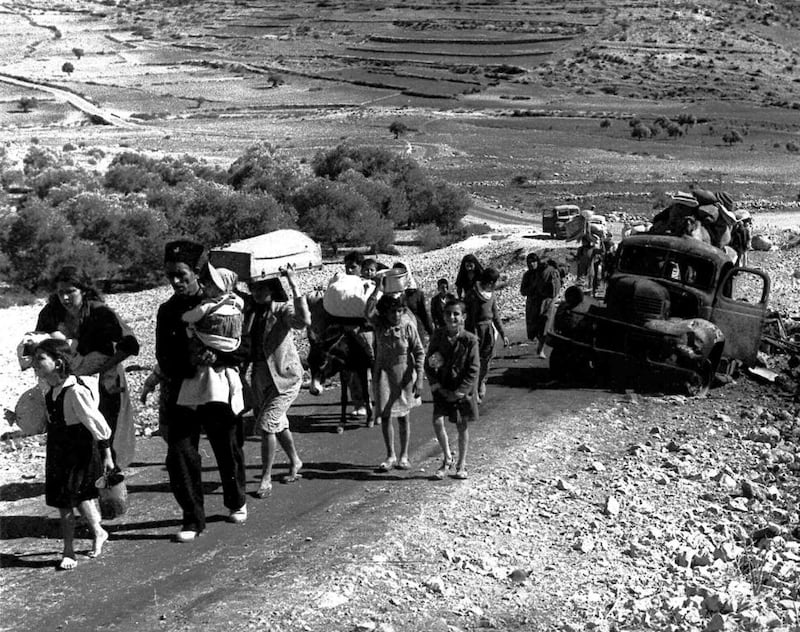 Palestinian refugees stream out of Palestine on the road to Lebanon in northern Israel to flee fighting in the Galilee region in the Arab-Israeli war on November 4, 1948.  AP Photo