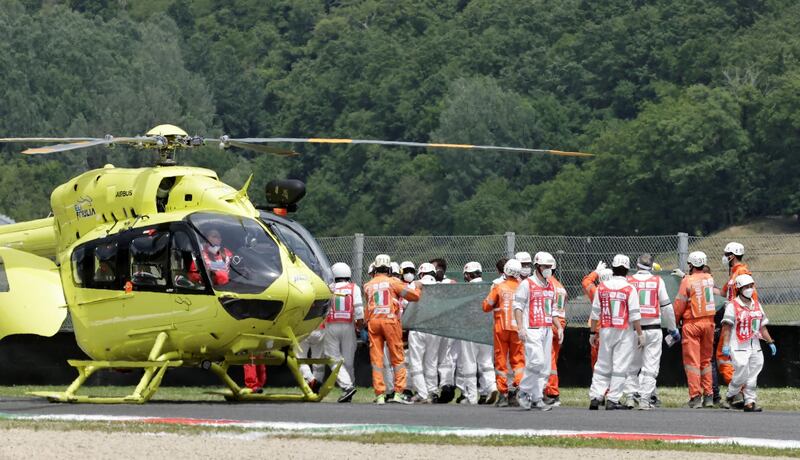 Moto3 rider Jason Dupasquier is carried to an helicopter after crashing during qualifying in Italy. He later succumbed to his injuries. Reuters