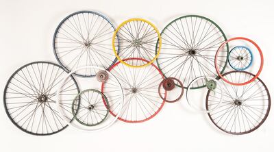 Old bicycle wheels can be upcycled to make for a stylish decor piece. Photo: Smithers of Stamford