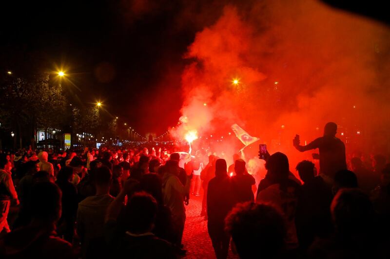 PSG supporters invade the Champs-Elysee after the Champions League defeat. AP
