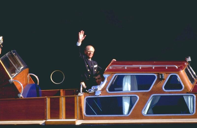 10 Aug 1996:  The duke of Edinburgh waves to the crowd during Cowes week in the Solent of the Isle of White. Mandatory Credit: Stephen Munday/Allsport