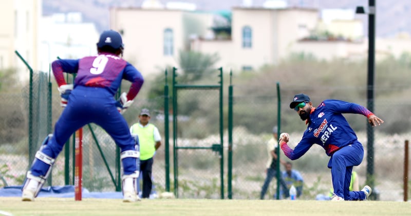 Dipendra Singh Airee of Nepal, who took two wickets for six runs, fields the balls.
