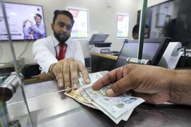 With global growth expected to rebound further in 2021, the World Bank estimates remittance flows to low- and middle-income countries to increase 2.6 per cent this year. Photo: Pawan Singh / The National     