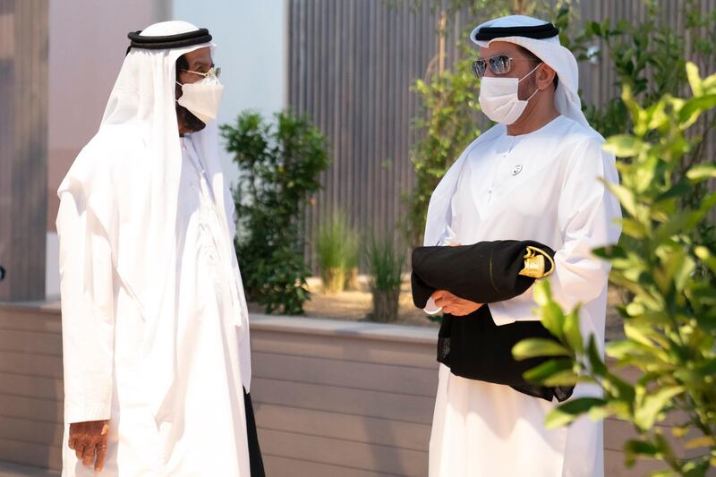 ABU DHABI, UNITED ARAB EMIRATES - December 02, 2020: HH Sheikh Tahnoon bin Mohamed Al Nahyan, Ruler's Representative in Al Ain Region (L) and HH Sheikh Hamdan bin Zayed Al Nahyan, Ruler’s Representative in Al Dhafra Region (R), attend the performance of ‘Seeds of the Union’ during the official 49th UAE National Day Celebrations at Jubail Mangrove Park.  

( Rashed Al Mansoori / Ministry of Presidential Affairs )
---