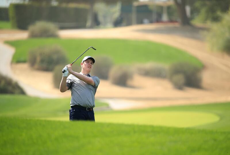 Scotland's Robert Macintyre plays his second shot on the 2nd hole on his way to a final round 74. Getty