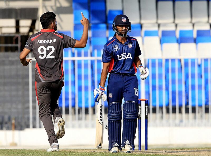 Sharjah, December, 08 2019: (L) Junaid Siddique of UAE celebrates after dismissing Monak Patel of USA (R) during the ICC Men's Cricket World Cup League 2 match at the Sharjah Cricket Stadium in Sharjah . Satish Kumar/ For the National / Story by Paul Radley