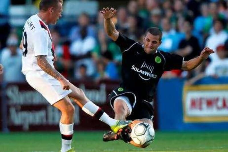 PORTLAND, OR - JULY 17: Craig Bellamy #39 of Manchester City of battles Tony McManus #12 of the Portland Timbers during a friendly match on July 17, 2010 at Merlo Field in Portland, Oregon.   Jonathan Ferrey/Getty Images/AFP== FOR NEWSPAPERS, INTERNET, TELCOS & TELEVISION USE ONLY == *** Local Caption ***  028735-01-10.jpg