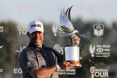 Lee Westwood celebrates winning the Abu Dhabi HSBC Championship on Sunday. Chris Whiteoak / The National