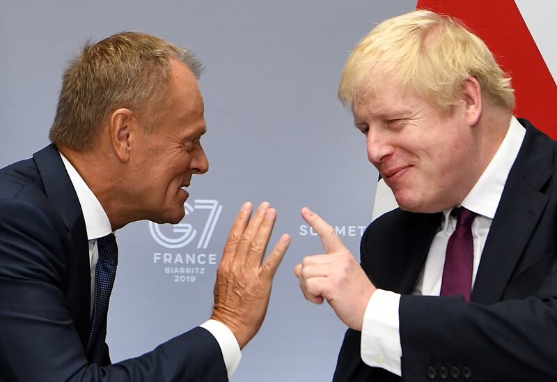 Mr Tusk, then president of the European Council, meets Boris Johnson, UK prime minister at the time, at the G7 summit in 2019 in Biarritz, France. Getty Images
