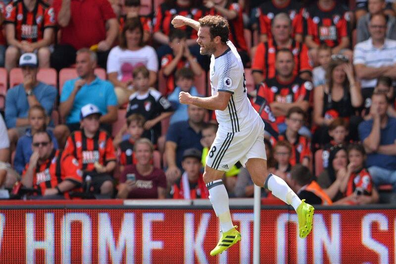 Manchester United midfielder Juan Mata celebrates scoring the opening goal during the Premier League football match between Bournemouth and Manchester United at the Vitality Stadium in Bournemouth, southern England on August 14, 2016. Glyn Kirk / AFP