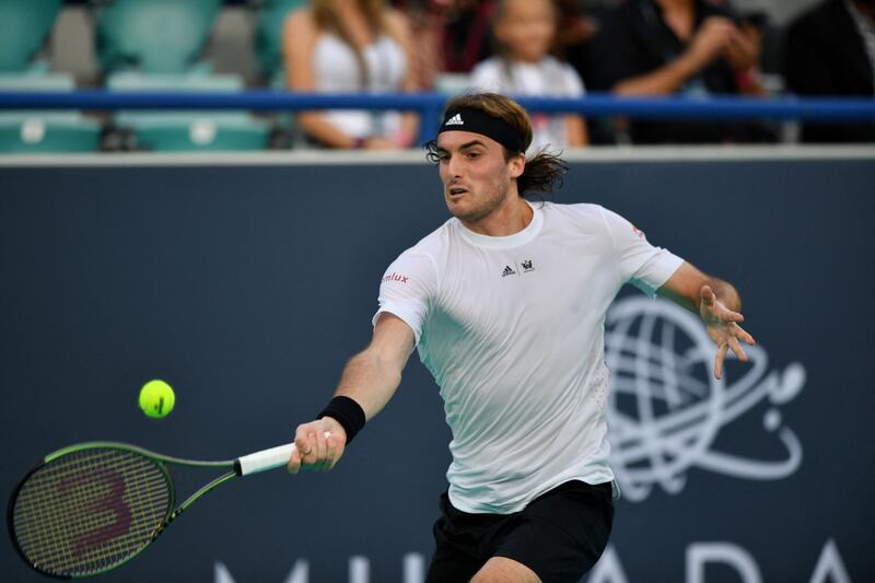 Stefanos Tsitsipas hits a forehand to Cameron Norrie. AFP