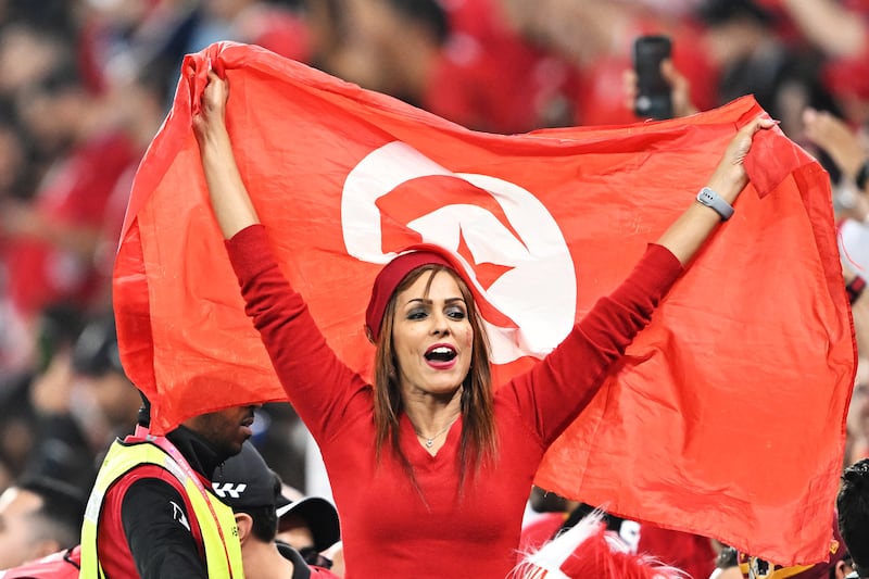 A Tunisian fan cheers during the FIFA World Cup 2022 group D soccer match between Tunisia and France at Education City Stadium in Doha, Qatar. EPA