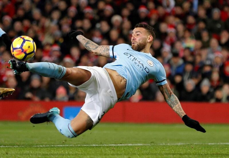 Soccer Football - Premier League - Manchester United vs Manchester City - Old Trafford, Manchester, Britain - December 10, 2017   Manchester City's Nicolas Otamendi scores their second goal                   REUTERS/Darren Staples    EDITORIAL USE ONLY. No use with unauthorized audio, video, data, fixture lists, club/league logos or "live" services. Online in-match use limited to 75 images, no video emulation. No use in betting, games or single club/league/player publications. Please contact your account representative for further details.     TPX IMAGES OF THE DAY