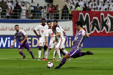 Tsukasa Shiotani scored Al Ain's second goal before Sharjah netted the equaliser during their Arabian Gulf League match on Wednesday. Pawan Singh / The National