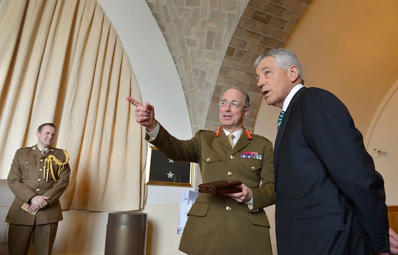 Tom Tugendhat is seen in the background as Gen Sir David Richards speaks to the US secretary of defense Chuck Hagel in 2013. Photo: DoD