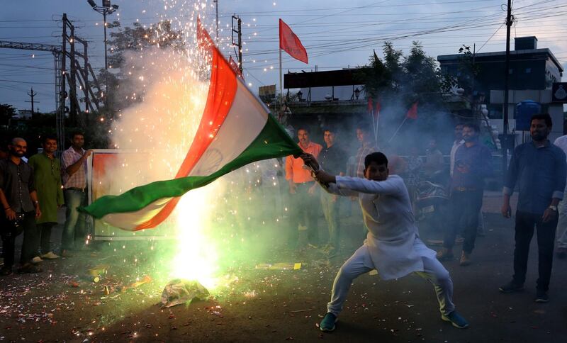 epa07758139 Akhil Bharatiya vidyarthi Parishad ( ABVP)  celebrate following reports that Indian government will remove the special status given to the Indian-administrated Kashmir, in Bhopal, India, 05 August 2019. Indian Home Minister Amit Shah moved a resolution in the parliament that repeals Article 370, and said the state will be split into two Union Territories Kashmir with an Assembly and Ladakh region without one.  EPA/SANJEEV GUPTA