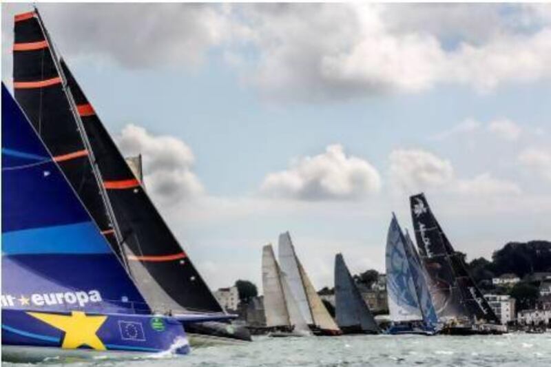 Abu Dhabi Ocean Racing’s Azzam, right, get an early edge during the start of the Rolex Fastnet Race 2013 on Wednesday. Photo courtesy of Daniel Forster / Rolex