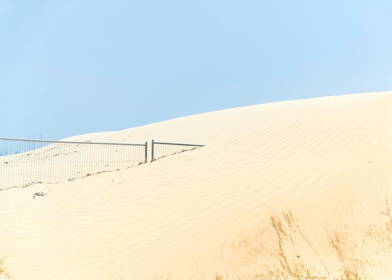 DUBAI, UNITED ARAB EMIRATES - JULY 15 2019.

Unfenced areas at Living Legends. No desert boundary at the development has been causing dangerous snakes and animals are regularly getting into the gardens and villas

Some residents and investors of Living Legends have paid Dh6m for villas, and pay Dh25,000 a year in service charges but the development still looks like a construction site, with an unfinished golf course, roads, open sewer works near the school.

(Photo by Reem Mohammed/The National)

Reporter: NICK WEBSTER
Section: NA