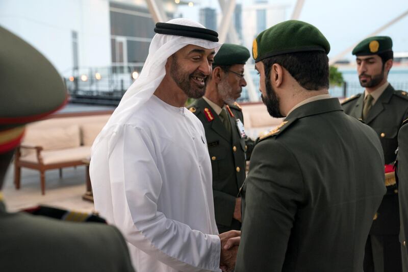 ABU DHABI, UNITED ARAB EMIRATES - November 12, 2018: HH Sheikh Mohamed bin Zayed Al Nahyan Crown Prince of Abu Dhabi Deputy Supreme Commander of the UAE Armed Forces (L), awards a members of the UAE Armed Forces with Medals of Bravery and Medals of Glory, during a Sea Palace barza. Seen with HE Lt General Hamad Thani Al Romaithi, Chief of Staff UAE Armed Forces (2nd L).
( Hamad Al Kaabi / Ministry of Presidential Affairs )?
---