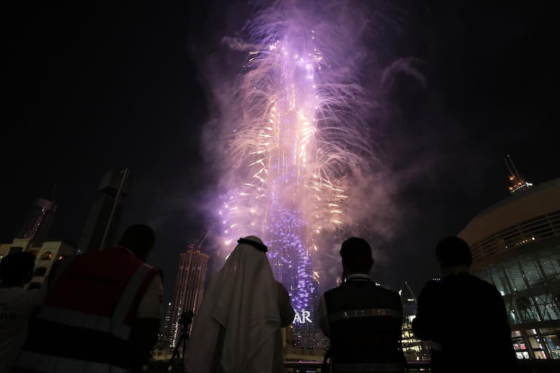 DUBAI , UNITED ARAB EMIRATES – Dec 31 , 2019 : Fireworks display on Burj Khalifa for the new year 2020 celebration at Dubai Mall in Downtown Dubai in Dubai. ( Pawan Singh / The National ) For News/Online/Instagram