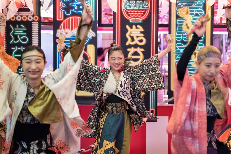 Dancers perform in Asakusa, one of Tokyo's most famous tourist spots. Getty Images