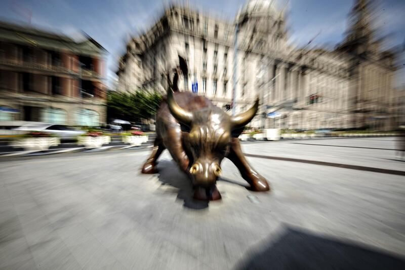 The Bund Bull statue stands in Shanghai, China, on Saturday, June 2, 2018. China's banks, scrambling to adjust to the government's deleveraging campaign, are likely to add to pressures on the corporate bond market as they shed more of their massive note holdings and de-risk their balance sheets. Photographer: Qilai Shen/Bloomberg