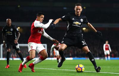 LONDON, ENGLAND - DECEMBER 02: Nemanja Matic of Manchester United is challenged by Alexis Sanchez of Arsenal during the Premier League match between Arsenal and Manchester United at Emirates Stadium on December 2, 2017 in London, England.  (Photo by Julian Finney/Getty Images)