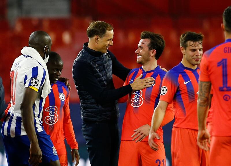 Soccer Football - Champions League - Quarter Final First Leg - FC Porto v Chelsea - Ramon Sanchez Pizjuan, Seville, Spain - April 7, 2021 Chelsea manager Thomas Tuchel celebrates with Ben Chilwell after the match REUTERS/Marcelo Del Pozo