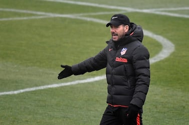 Diego Simeone leads Atletico Madrid's training session ahead of the Champions League tie against Lokomotiv Moscow. AFP