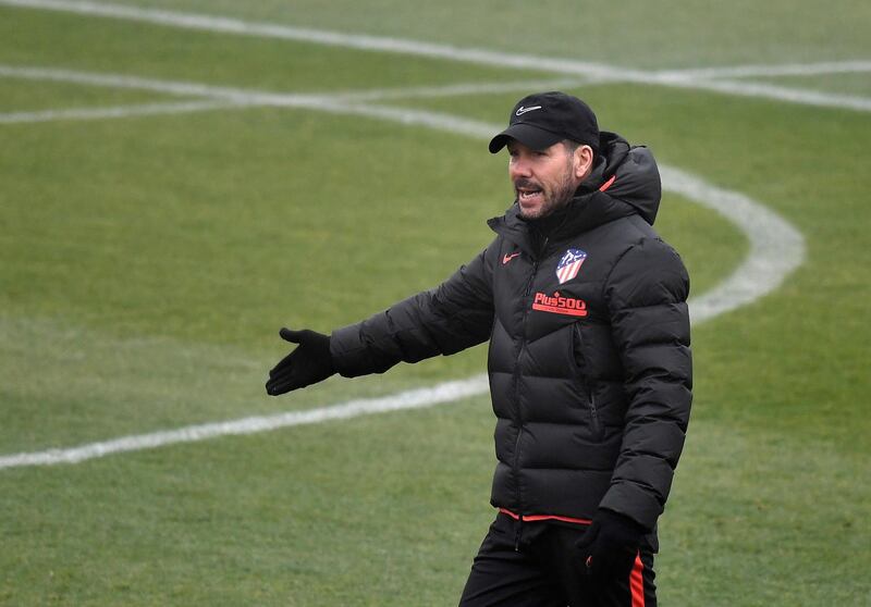 Atletico Madrid's Argentinian coach Diego Simeone attends a training session at the Atletico de Madrid Sports City in Majadahonda on december 10, 2019 on the eve of their Champions League football match against Lokomotiv Moscow. / AFP / PIERRE-PHILIPPE MARCOU
