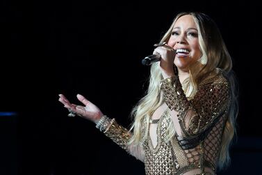  Mariah Carey is the first artist to have number one hits in four different decades. Kamran Jebreili / AP photo