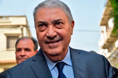 (FILES) In this file photo taken on February 20, 2019 Former Algerian prime minister Ali Benflis, who heads the Avant Garde of Freedom party, arrives at a meeting of opposition figures in Algiers. Former premiers Ali Benflis and Abdelmadjid Tebboune are considered front-runners in an election opposed by the mass protest movement that alongside the army forced Bouteflika to resign in April after 20 years in power. / AFP / RYAD KRAMDI
