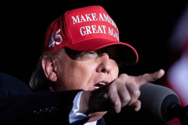 (FILES) In this file photo taken on November 01, 2020 US President Donald Trump speaks during a Make America Great Again rally at Richard B. Russell Airport in Rome, Georgia. President Donald Trump pressured the Georgia secretary of state in an extraordinary phone conversation Saturday to "find" enough votes to overturn Joe Biden's victory in the Southern state, news media reported on January 3, 2021. The secretly taped conversation with fellow Republican Brad Raffensperger, first reported by the Washington Post, includes threats that Raffensperger and another Georgia official could face "a big risk" if they failed to pursue his request. / AFP / Brendan Smialowski
