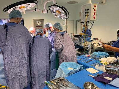 Surgeons performing the transplant. PA
