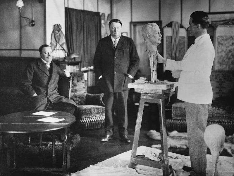 Brothers Alfred (r) and Harold Harmsworth (Lords Northcliffe and Rothmere), in Courtenay Pollock's studio, while he sculpts a head of Lord Northcliffe. Both men are newspaper magnates. (Photo by © Hulton-Deutsch Collection/CORBIS/Corbis via Getty Images)