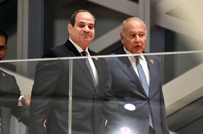 Egypt's President Abdel Fattah El Sisi, left, and Arab League Secretary Ahmed Aboul Gheit arrive for the opening of the Arab summit in Algiers on November 1, 2022.  AFP