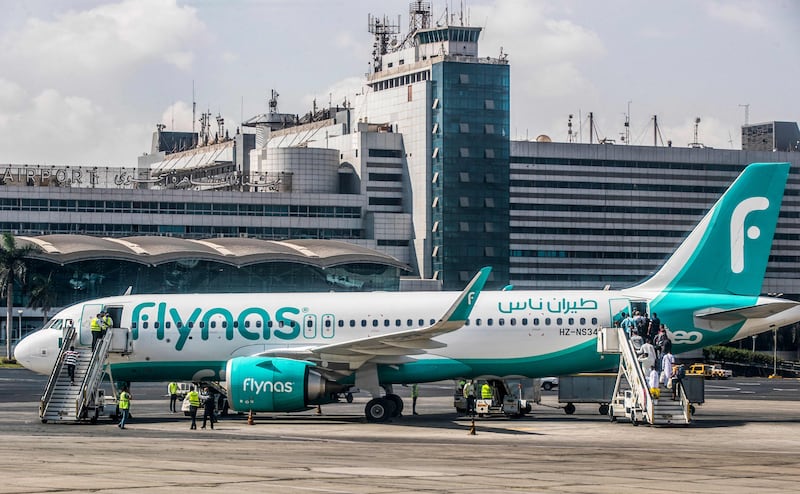 Saudi Arabian low-cost airline Flynas' Airbus A320 aircraft on the tarmac at Cairo International Airport.  AFP