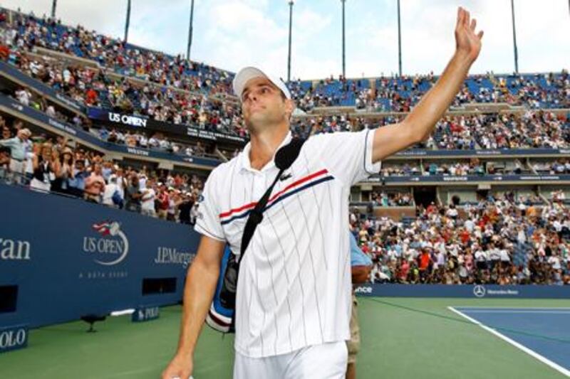 Andy Roddick says farewell to the US Open crowd after his defeat to Juan Martin Del Potro.