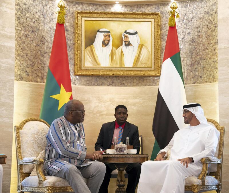 ABU DHABI, UNITED ARAB EMIRATES - April 24, 2019: HH Sheikh Mohamed bin Zayed Al Nahyan, Crown Prince of Abu Dhabi and Deputy Supreme Commander of the UAE Armed Forces (R), receives Roch Marc Christian Kabore, President of Burkina Faso (L), at Al Shati Palace. 

( Mohamed Al Hammadi / Ministry of Presidential Affairs )
---