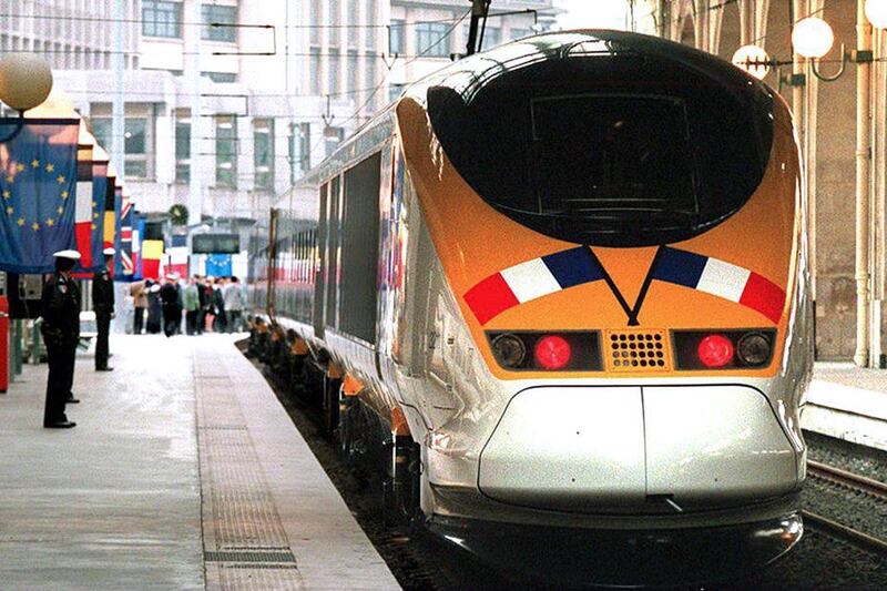 The inaugural TGV-Eurostar train leaves the Paris Gare du Nord station, carrying French president François Mitterrand and prime minister Edouard Balladur to their rendezvous with Queen Elizabeth II on May 6, 1994. Jean-Loup Gautreau / AFP
